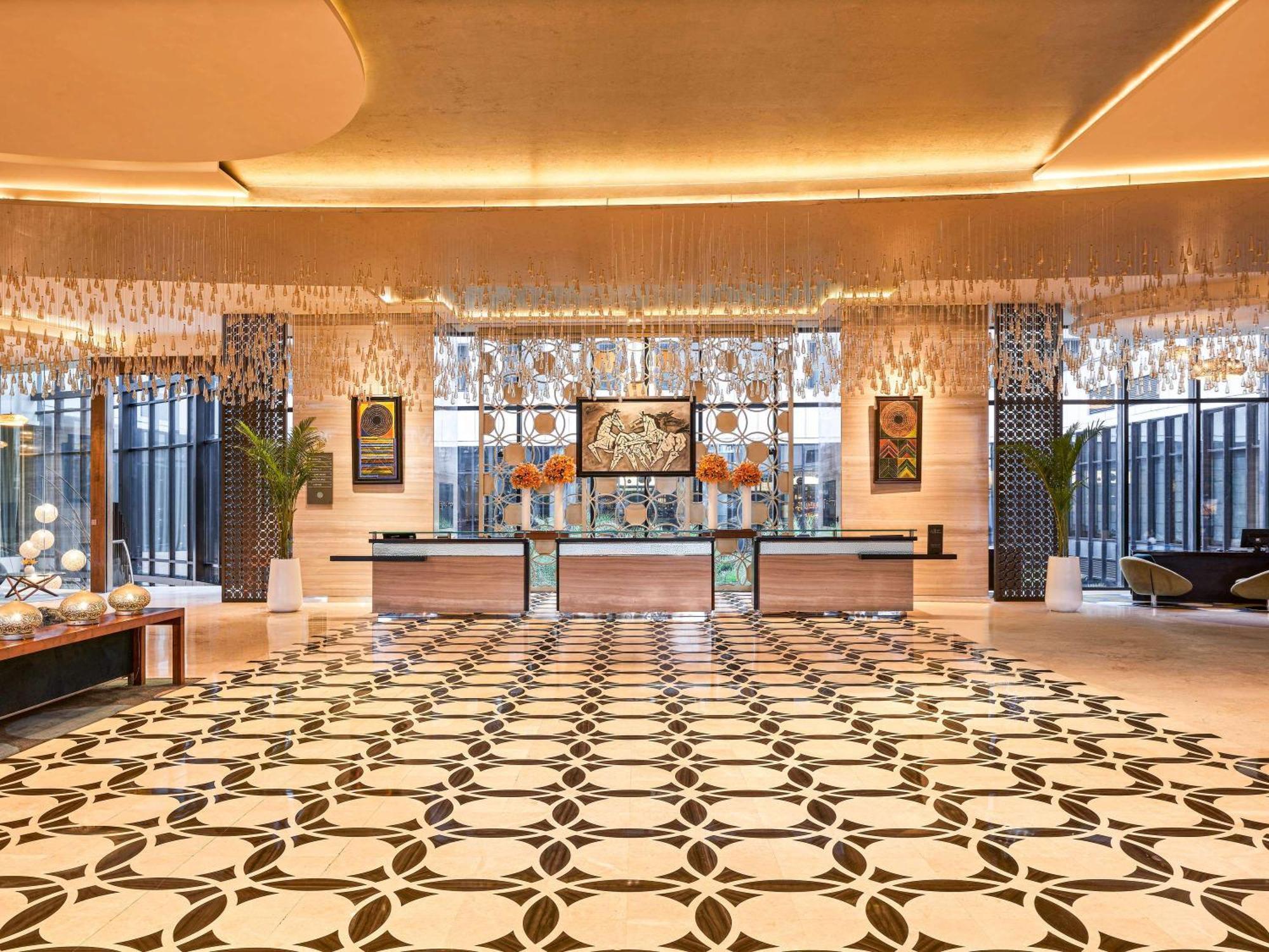 Pullman New Delhi Aerocity Экстерьер фото The lobby of the hotel