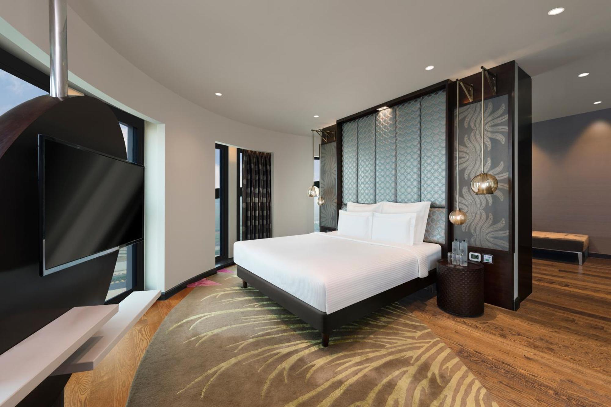 Pullman New Delhi Aerocity Экстерьер фото Suite bedroom
